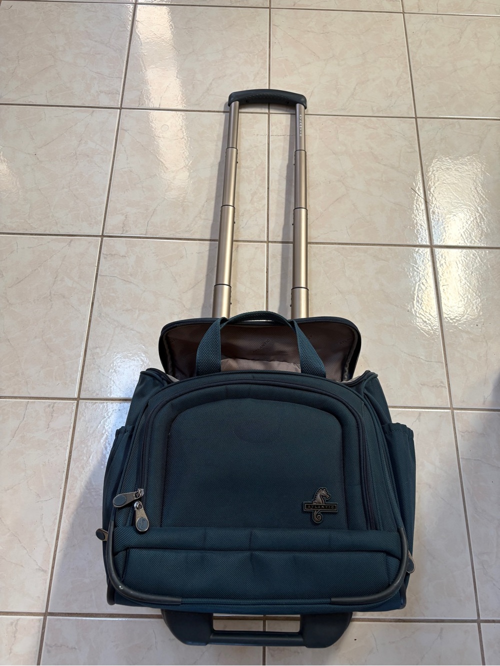 Atlantic Rolling Travel Bag in Teal with Telescoping Handle